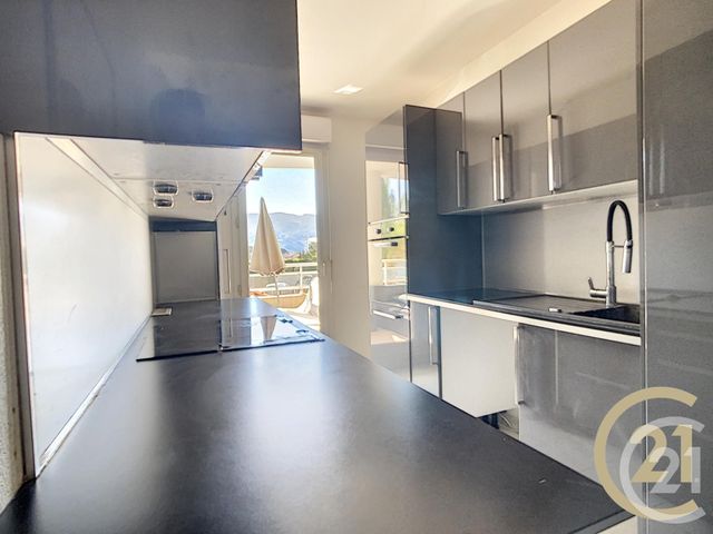 Afficher la photo en grand Appartement F4 à vendre - 4 pièces - 74.87 m2 - CANNES LA BOCCA - 06 - PROVENCE-ALPES-COTE-D-AZUR - Century 21 Immobilier Conseil