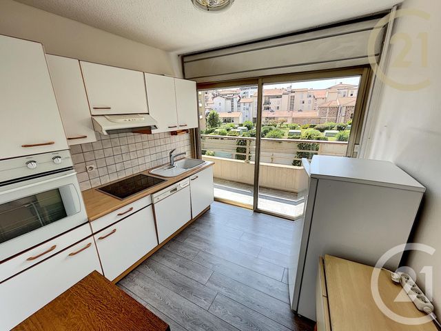 Afficher la photo en grand appartement à vendre - 2 pièces - 48.0 m2 - CANNES LA BOCCA - 06 - PROVENCE-ALPES-COTE-D-AZUR - Century 21 Immobilier Conseil